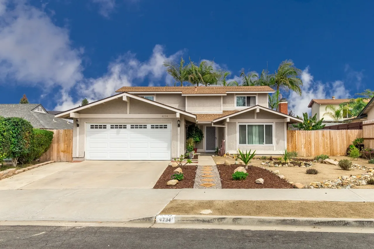 Two-story residence — Smooth exterior stucco, by Angel Brothers