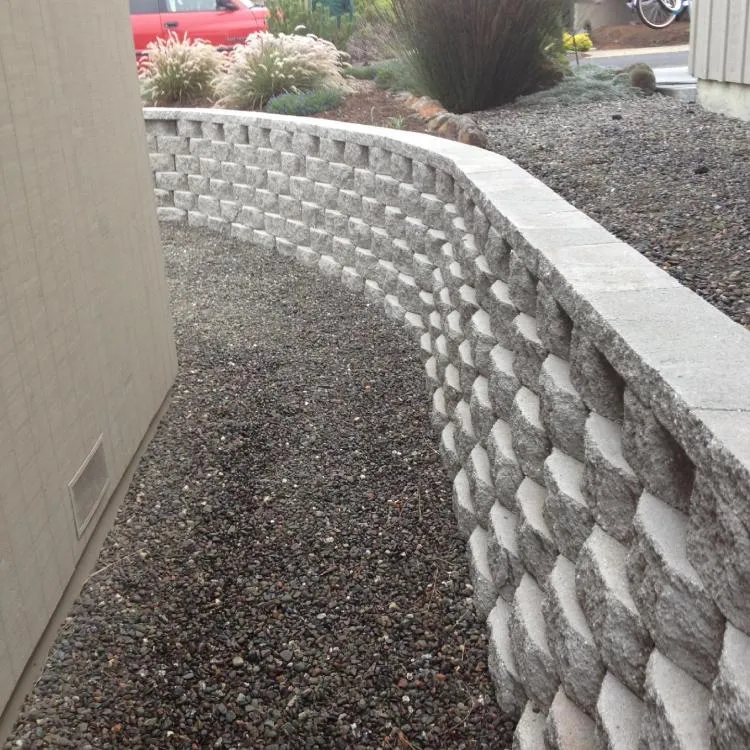 Curved segmental-block retaining wall