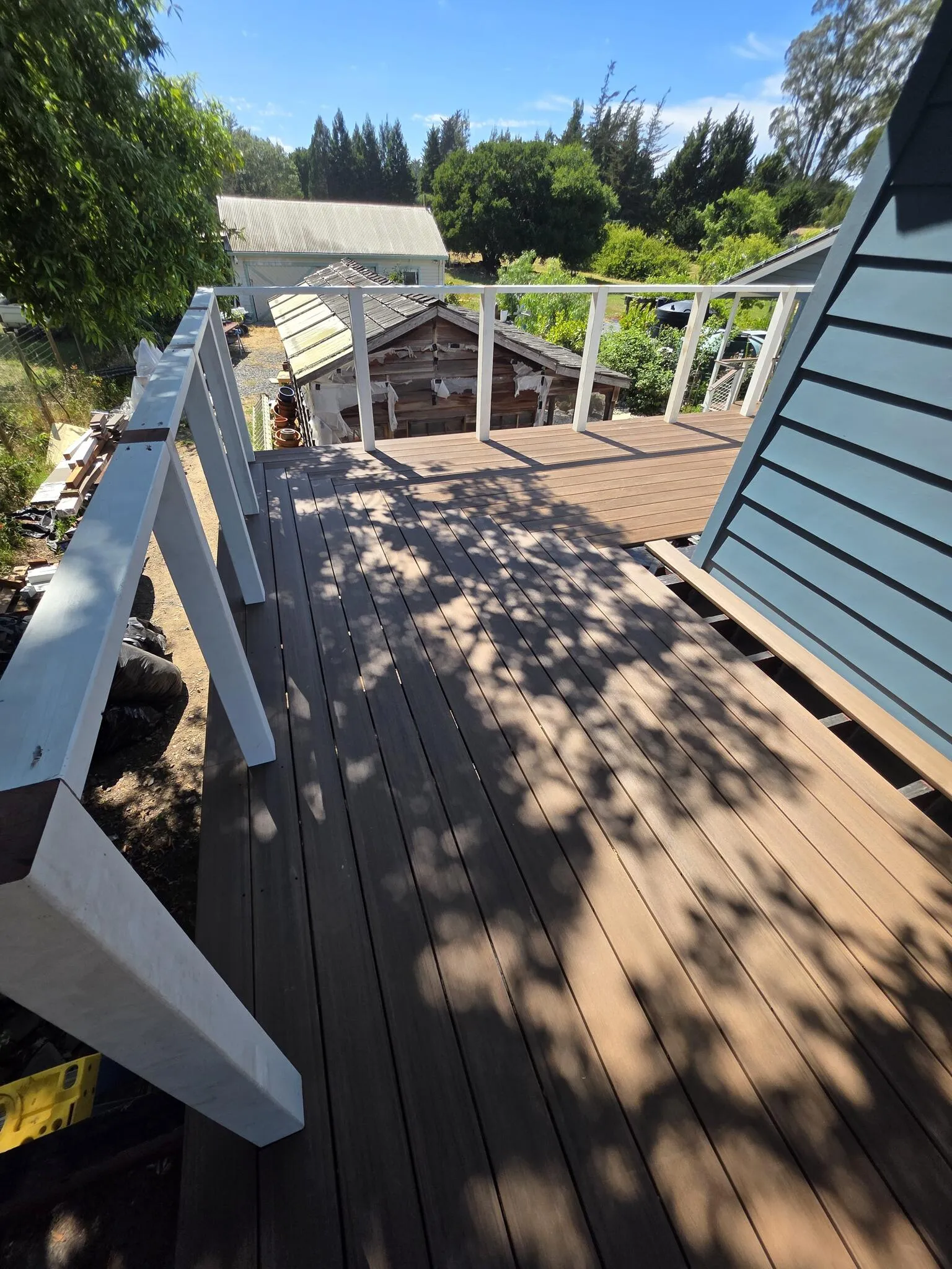 Elevated deck walkway with stainless cable railing