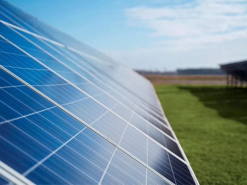 Rooftop solar array installed by Vital Energy with the Sonoma County hills and bay in the distance